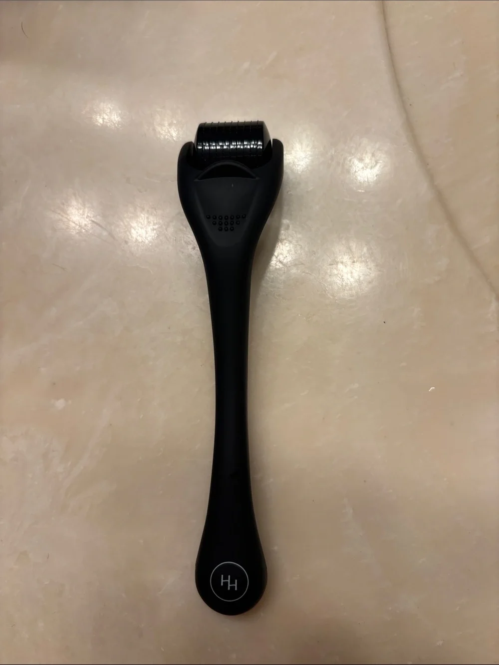 Happy Head scalp dermaroller. New in original box. Comes with case.
